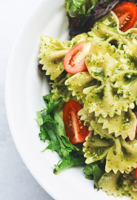 Farfalle with basil pesto and tomatoes