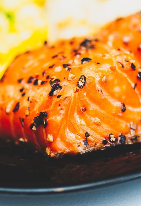 Glazed salmon fillet with charred edges